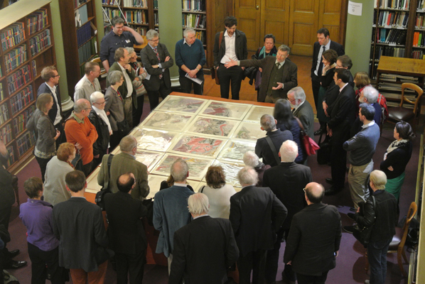 Visitors view the newly discovered copy of William Smith's map, with Tom Sharpe on hand to explain the history of its creation